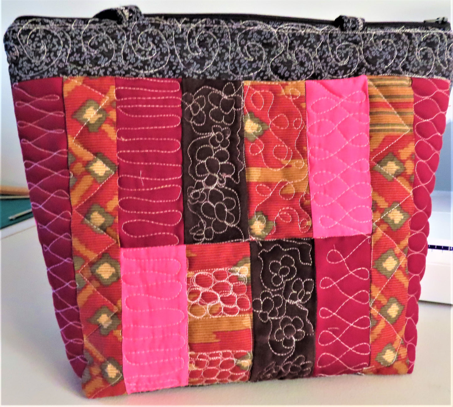 Handmade Jelly Roll quilted zipper tote bag