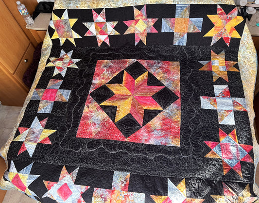 Handmade patchwork Sunset Star Quilt