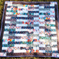 Sticks quilt made from jelly roll patchwork hand made with love